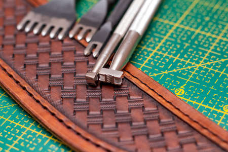 making stamping on leather with handtools