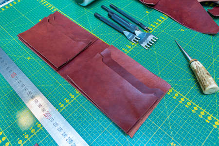 Creating sewing leather handmade wallet leathercraft. Pattern, tools, leather