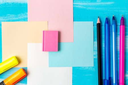 Back to school concept with stationery office supplies pens, pencils, brushes, felt pens, markers,...