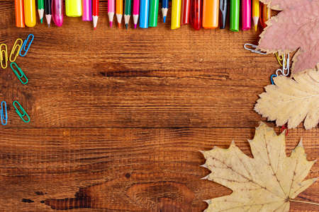 composition with notebook blank page colorful pencil, marker and pen mock-up Back to school concept