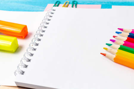 Back to school concept with stationery office supplies pens, pencils, brushes, felt pens, markers,...