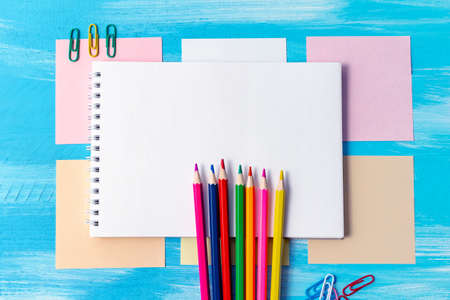 Back to school concept with stationery office supplies pens, pencils, brushes, felt pens, markers,...