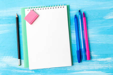 Back to school concept with stationery office supplies pens, pencils, brushes, felt pens, markers,...