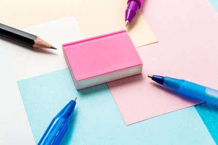 Back to school concept with stationery office supplies pens, pencils, brushes, felt pens, markers,...