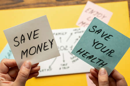 Motivational text, phrases on note papers in hand