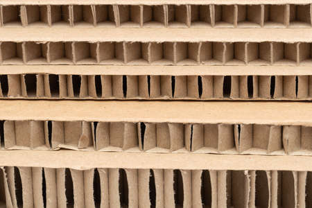 cut of honeycomb cardboard pack stack with large cells close-up as a backgroundの写真素材