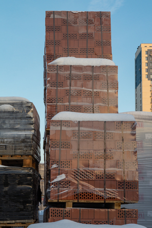 A red brick is built on the yard for construction country house