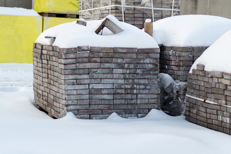 Pallets with bricks in the store. Racks of brick.の写真素材