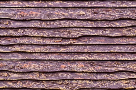 The texture of the stones covered with brown lacquer, can be used as a background for advertising