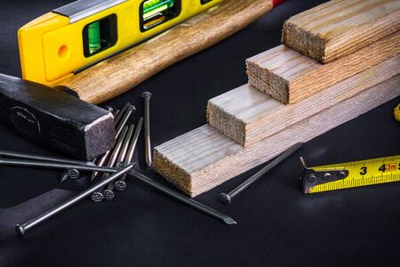Professional tools for carpentry and accessories. Set for the master on blackの写真素材