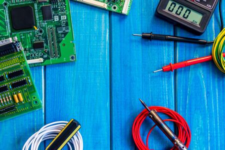 Services for the production of electronics and repair on a wooden blueの写真素材