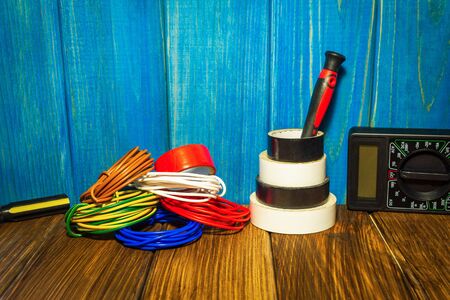 Tools and accessories on a vintage blue and brown wooden