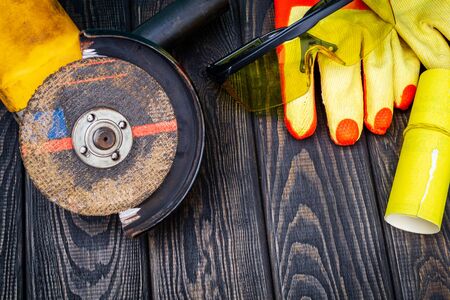 Abrasive tool and builder protection on dark vintage wood