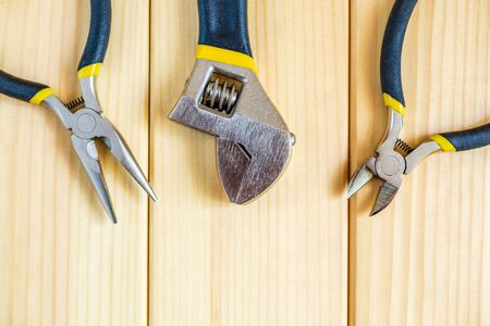 Tools for master builder and accessories set on wooden background for the master Builderの写真素材