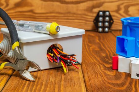 Electrical junction boxs with cables wire and tool usually used in the electric installation process