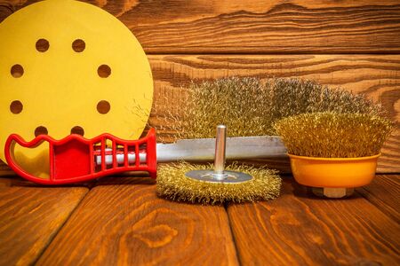 Set of abrasive tools and sandpaper on vintage wooden boards wizard is used for grinding itemsの写真素材