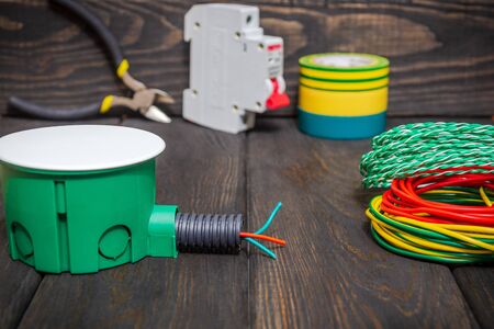 Electrical junction green box with wires usually used in the electric installation process