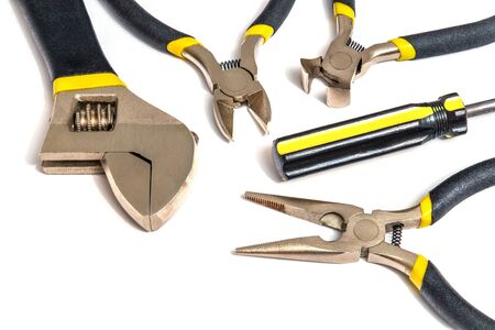 Large set of tools for master plumber or electrician on white isolated background