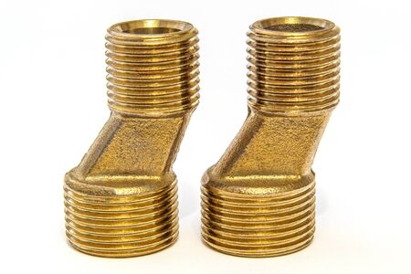 Two brass fittings on white background is often used to connect for water and gas installationsの写真素材