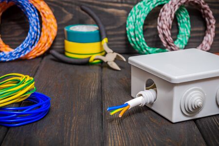 Electrical junction gray box with wires usually used in the electric installation processの写真素材