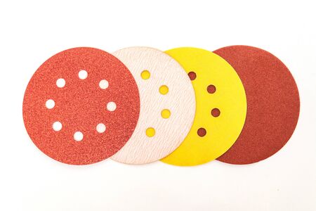 Set of abrasive tools different colors on white background, wizard is used for grinding itemsの写真素材