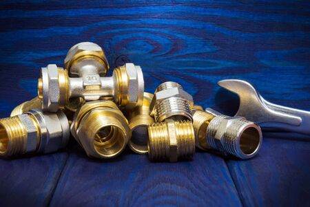 Brass plumbing fittings home depot on blue boards used in gas or water pipingの写真素材