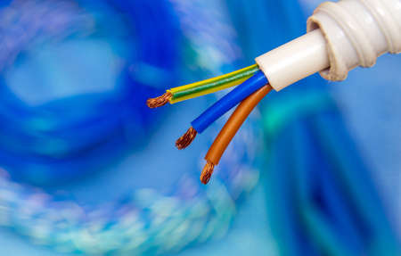 Cable with electric wires of different colors. Used to connect to electrical networkの写真素材