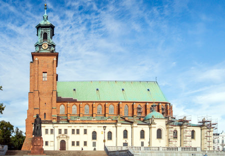 View of Cathedral Basilica in the city center of Gniezno, popular tourist destination: Gniezno / Poland - 12 October 2020のeditorial素材