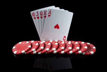 Poker cards with royal flush combination. Close-up of playing cards and chips in poker club. Free...