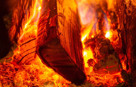 Red coals from a burnt fire made of wood. Metal mining and processing industry.の写真素材