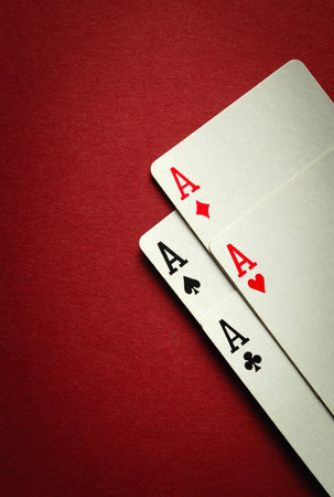 A winning combination of four aces in playing cards or four of a kind or quads. Concept of luck in...
