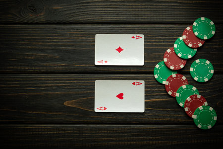 A good combination of one pair of poker cards - winning chips when playing in a club on a black...