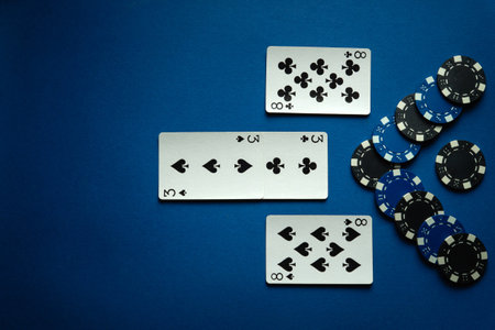 Two pairs of playing cards in poker give a good win of chips. The concept of winning in a card game...
