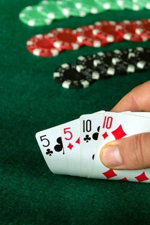 Poker cards with two pair combinations in the player hand. A winning combination in a game in a...