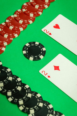 The winning cards with a combination of one pair are neatly laid out on the green table, and the...