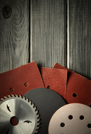 Large set of abrasive tools and sandpaper for cleaning or sanding wooden boards. Industrial professional tools.の写真素材
