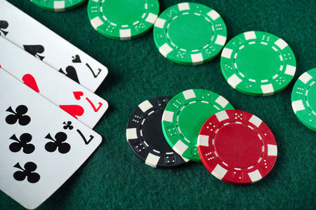Friends gather for a lively evening of poker, playing cards with colorful chips. Around a green...