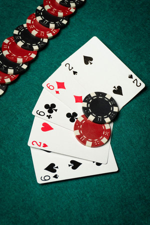 Poker gambling concept. Winning combination of playing cards full house or full boat on the table...