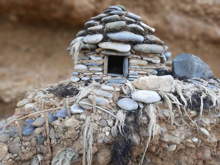 small pebble house by the sea. miniatureの写真素材