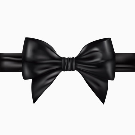 Decorative realistic black bow with ribbon isolated on white background.のイラスト素材