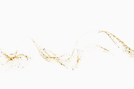 Scattered golden particles on white background. Holiday background or design element. New Year and Christmasのイラスト素材
