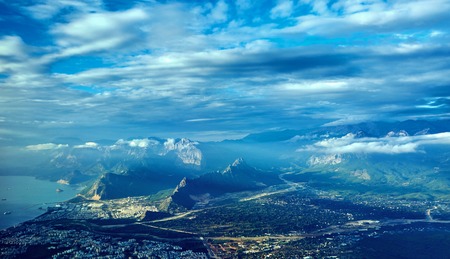 view of the mountains from an airplane above the clouds. Antalya, Turkey.の写真素材