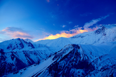 beautifull cloudy sunrise in the mountains with snow ridge. Annapurna region, Himalayas, Nepal.の写真素材