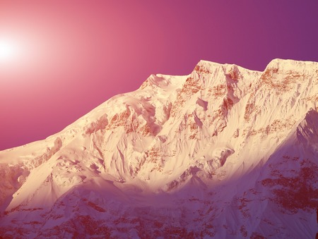 mountain peak in the Annapurna ridge at sunset, Himalayasの写真素材