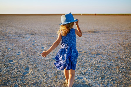 girl in the desert at the  sunsetの写真素材