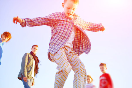 boy on the sea beach at the early morningの写真素材