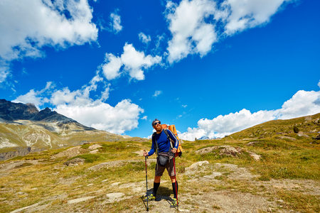 hiker in the Apls mountains. Trek near Matterhorn mountの写真素材