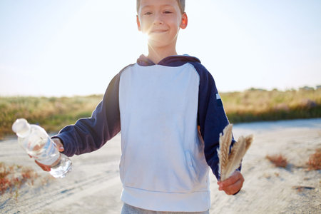 boy in the desert at the  sunsetの写真素材