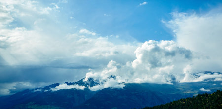 beautifull cloudy sunrise in the mountains with snow ridge. Alps. Switzerland, Trek near Matterhorn mount.の写真素材