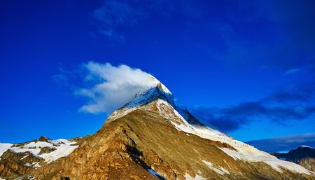 Snow capped mountains.  Top of the mount. View of the  Matterhorn mount at the sunrise.の写真素材